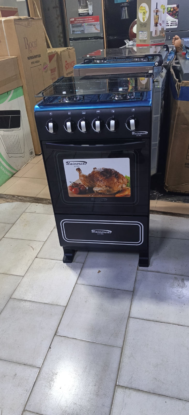 Gazinet Universal 4 feux 2 four en bas automatique,la livraison est gratuite partout Abidjan le paiement ce passe a la livraison : 0565296300 WhatsApp - 2